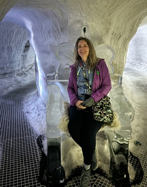 Leann Wright, a Pavlus Travel air concierge specialist, explores an ice cave at the Perlan Museum in Iceland. Photo by Leann Wright.