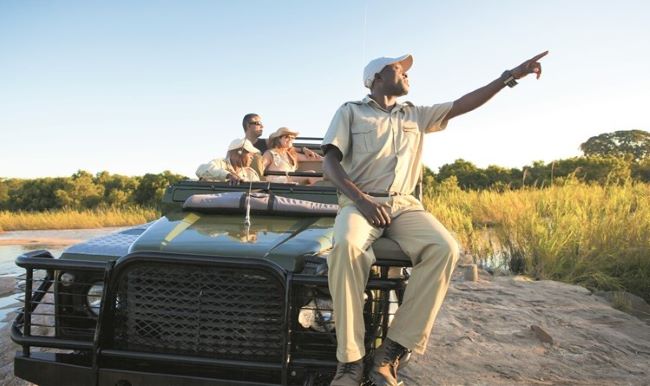 Sabi Sands is a private game reserve with superb wildlife viewing opportunities as guests head out via a safari vehicle. Photo by South Africa Tourism. 