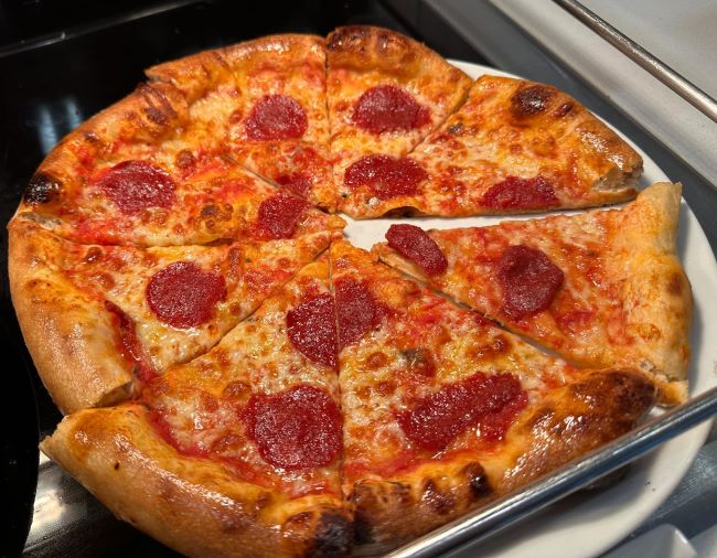 A pepperoni pizza is shown on a Viking ocean ship. Photo by Chris Owen.