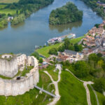 A Tauck river vessel is shown above docked near Les Andelys on the River Seine, just below Chateau Gaillard. Photo by Tauck.