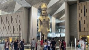 Greeting visitors to the new Grand Egyptian Museum is a huge ancient statue of Ramses II. Photo by Susan J. Young.