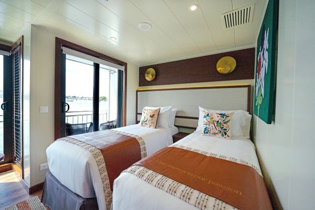 A stateroom set up in twin configuration on AmaWaterways' new AmaMagdalena. That ship is sailing in a new region on Colombia's Magdalena River. Photo by AmaWaterways.