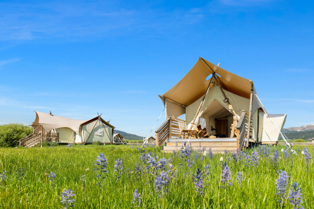 Tauck's guests on a new tour will enjoy "glamping" during new tours within the U.S. Shown above is Under Canvas West Yellowstone. Photo courtesy of Tauck.