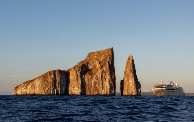 Silver Origin is shown at Kicker Rock in the Galapagos Islands of Ecuador. Photo by Silversea Cruises.