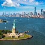 New York Harbor's Statue of Liberty is among the sites that guests on Holland America's "250th American Celebration" can explore on a July 4, 2026, special voyage. Photo by Holland America Line.