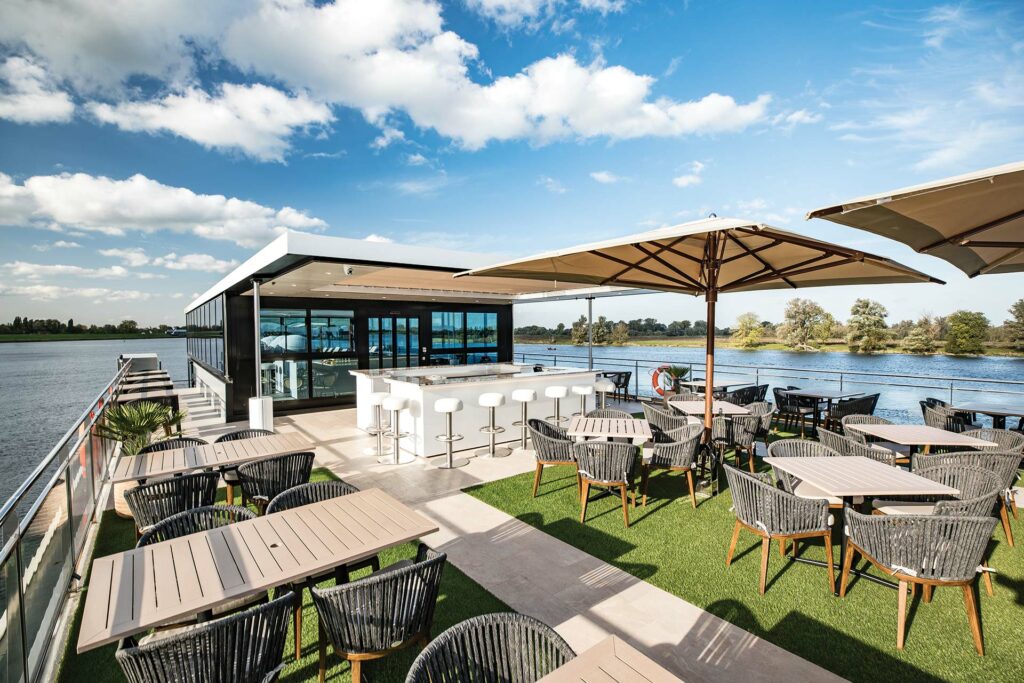 Tauck's Andorinha, a sister to the new river vessel the company is building for launch in 2027, has this top-deck Arthur's restaurant and bar. Photo courtesy of Tauck.