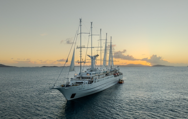 Windstar's flagship Wind Surf is among the vessels that will be sailing a robust season of 2026-2027 Caribbean voyages. Photo by Windstar Cruises. 